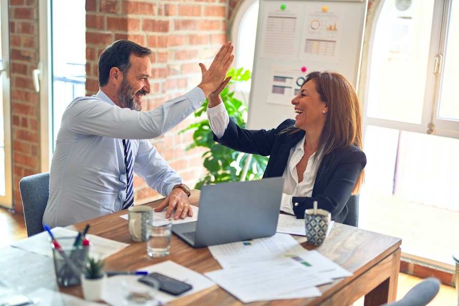 A team working through a business discussion